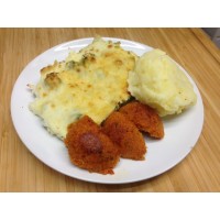 Émincé de poulet sauce brune à l'orange, poêlée de courgettes et pommes sautés