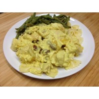 Fricassée de volaille créole, gâteau de carottes et riz sauvage