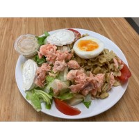 Émincé de poulet sauce brune à l'orange, poêlée de courgettes et pommes sautés