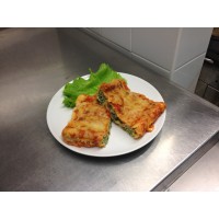 Émincé de poulet sauce brune à l'orange, poêlée de courgettes et pommes sautés