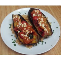 Aubergine farcie à la Carlton et mélange de graines