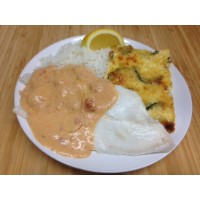 Émincé de poulet sauce brune à l'orange, poêlée de courgettes et pommes sautés