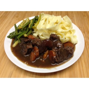Daube de bœuf provençale, riz blés et gratin de courgettes